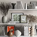 Stylish Decorative Ornament Combinations On Shelves With Vases Frames Books And Dried Plants