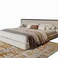 Modern White Double Bed with Soft Headboard Decorative Pillows Blanket and Nightstand Rug