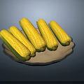 Fresh Yellow Corn Cobs With Green Leaves Placed On A Decorative Plate