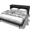 Double Bed with Black Headboard White Mattress Patterned Blanket and Slim Metal Legs Design