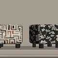 Geometric and Floral Pattern Stools With Short Black Legs on Light Colored Surface 3d model