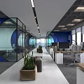 Open Public Office Interior With Blue Walls Glass Partitions Green Plants Desks Computers And Sofa
