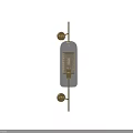 Modern Wall Lamp With Transparent Glass Shade And Golden Metal Warm Lighting On Dark Wall