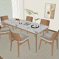 Minimalist Dining Table Set with White Top Wooden Legs Beige Cushion Chairs and Green Plant