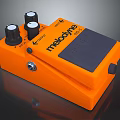 Orange Melodyne Throat Electronic Device With Control Knobs And Pedal