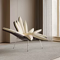 Petal Shaped Beige And Dark Brown Upholstered Lounge Chair With Metal Frame In Modern Interior