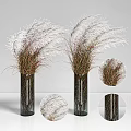 Glass Cylindrical Vase With White Plume Reed Grass And Green Red Stems For Home Decor