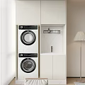 Stacked Washing Machines in Modern Laundry Space with White Cabinets Marble Countertop and Sink