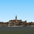 European Style Commercial Complex with Tower Red Roofs and Multi Story Buildings in Open Square