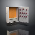 Open Industrial Control Panel With Metal Enclosure Orange Interior Red Knobs And Cables At Bottom