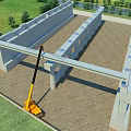 Construction Site Featuring Structural Framework Yellow Crane On Sandy Ground With Green Grass And Trees
