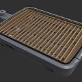 Portable Outdoor BBQ Grill With Metal Grates And Silver Frame Design
