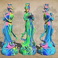 Three Colorful Traditional Female Statues As Garden Ornaments With Vibrant Hues And Intricate Details