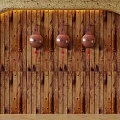 Brown Wooden Wall With Three Copper Pot Shaped Objects Hanging And Red Decorations