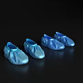 Four pairs of blue semi transparent shoes on black background