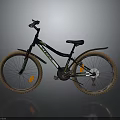 Black And Green Rockrider Mountain Bike With Brown Tires And Orange Reflectors