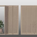 Wooden Window Shutters Open And Closed In Light Wood Indoor Scene With Potted Plant