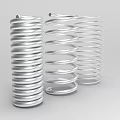 Various Metal Coiled Springs Arranged With Different Spiral Designs and Sizes