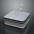 Modern Bathroom Sink In White With Black Stripes And Chrome Faucet On Dark Surface