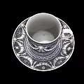 Elegant Ceramic Cup And Saucer Set With Intricate Black White Decorative Patterns 3d model