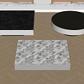 Modern Coffee Tables With Marble Tops And Metal Bases On Herringbone Wood Floor