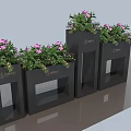 Black Garden Planters With Pink Flowering Plants And Brand Logo Decor