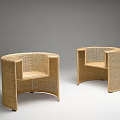 Pair Of Modern Rattan Leisure Chairs With Curved Armrests And Natural Rattan Finish