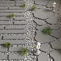 Natural Rockery Stones With Stone Paths Decorative Lanterns Pebbles And Small Plants