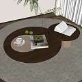 Round Wooden Coffee Table On Gray Rug With Open Book Green Plant Teacup And Books