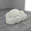 White Curved Sectional Sofa With Soft Pillows In Minimalist Gray Floor Interior Room