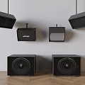 Modern Home Audio System With Wall Mounted Speakers And Floor Standing Subwoofers
