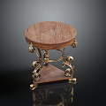 Round Wooden Table With Ornate Gold Metal Legs And Lower Shelf
