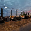 Rooftop Bar Outdoor Lounge With Sofa Table Wine Bread Umbrella And Evening View