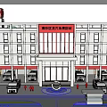 Modern Office Building With Red Signage White Exterior Red Accents Fire Trucks And Trees