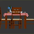 Dining Table Set with Red and White Checkered Tablecloth and Wooden Chairs