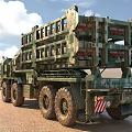 Camouflaged Military Missile Launch Vehicle With Elevated Launcher In Desert Terrain