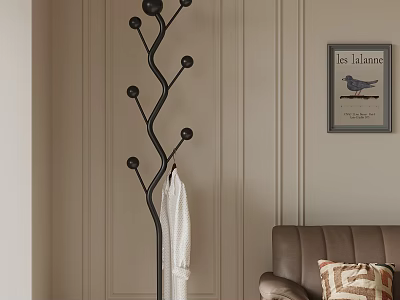 Black Tree Shaped Coat Rack With White Bathrobe Near Brown Sofa And Geometric Pillow 3d model
