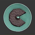 Delicious Chocolate Cake on Blue Plate with Top Blue Decorative Ball and Sliced Exposed Layers
