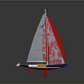Sailboat Model With Red and Gray Sails Wooden Hull and Red Stand on Gray Background