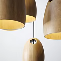 Modern Wooden Egg Shaped Pendant Lights With Holes Hanging In Interior Decor