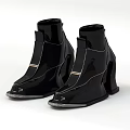 Stylish Black Patent Leather Ankle Boots with Unique High Heel Design and Metallic Accents