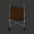 Old Vintage Wheelchair with Metal Frame and Brown Seat as Living Supplies