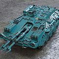 Teal Military Tank Vehicle With Dual Cannons Tracks And Heavy Armor