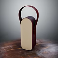 Brown Handbag With Curved Handle And Light Dark Panel On Wooden Tabletop