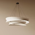 Modern White Layered Circular Chandelier Hanging With Black Cables Against Beige Wall