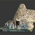 Traditional Stone Dome Building with Circular Structure and Wooden Entrance Surrounded by Green Grass