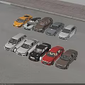 Various Colored Car Models In Different Styles Arranged On Ground
