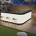 Stylish Outdoor Bar With Black Countertop White Base And Gold Bar Stools On Wooden Deck
