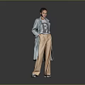 Kid Standing In Gray Background Wearing Light Blue Coat And Beige Pants