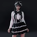 Woman in Black and White Maid Costume with Long Black Hair and White Lace Details